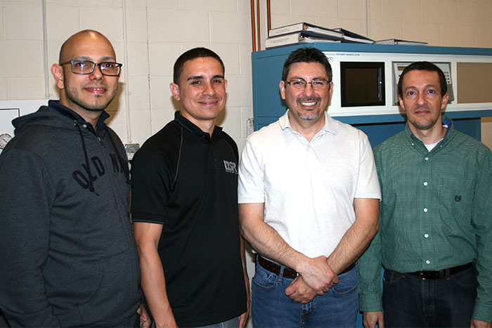 Puerto Rican technical reps receive training.